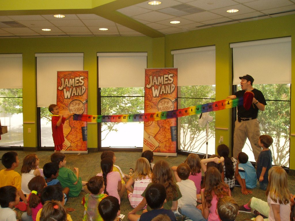 James Wand performing a library magic show